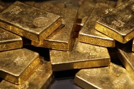 Цените на златото се оттеглиха от осемседмичен връх