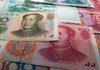 Китайският юан с най-ниската си стойност спрямо долара за десетилетие
