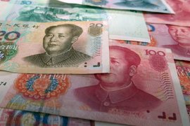Китайският юан с най-ниската си стойност спрямо долара за десетилетие